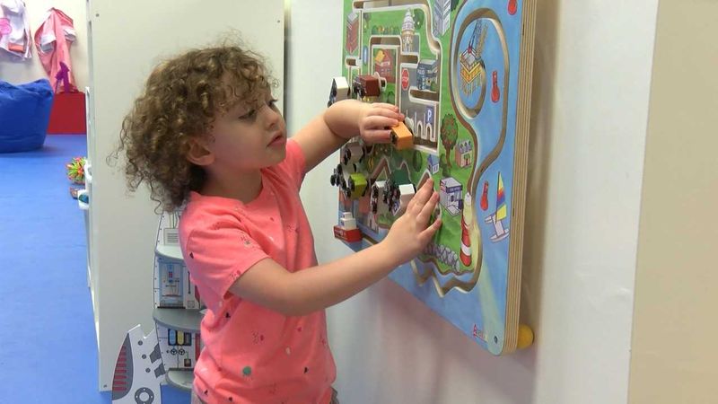 girl playing with toys at we rock the spectrum kids gym audubon new jersey